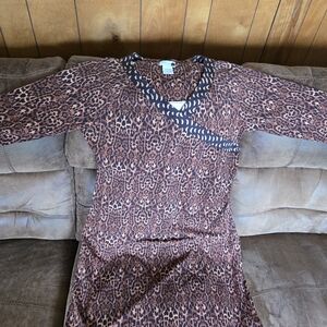 Leopard Dress with side kick pleat and diagonal accent, V neck.